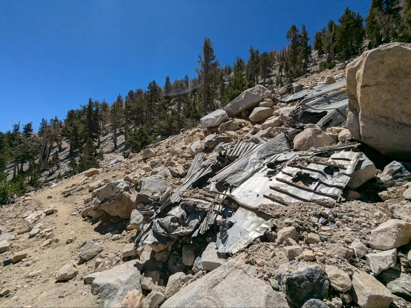 Aircraft remains flank the trail